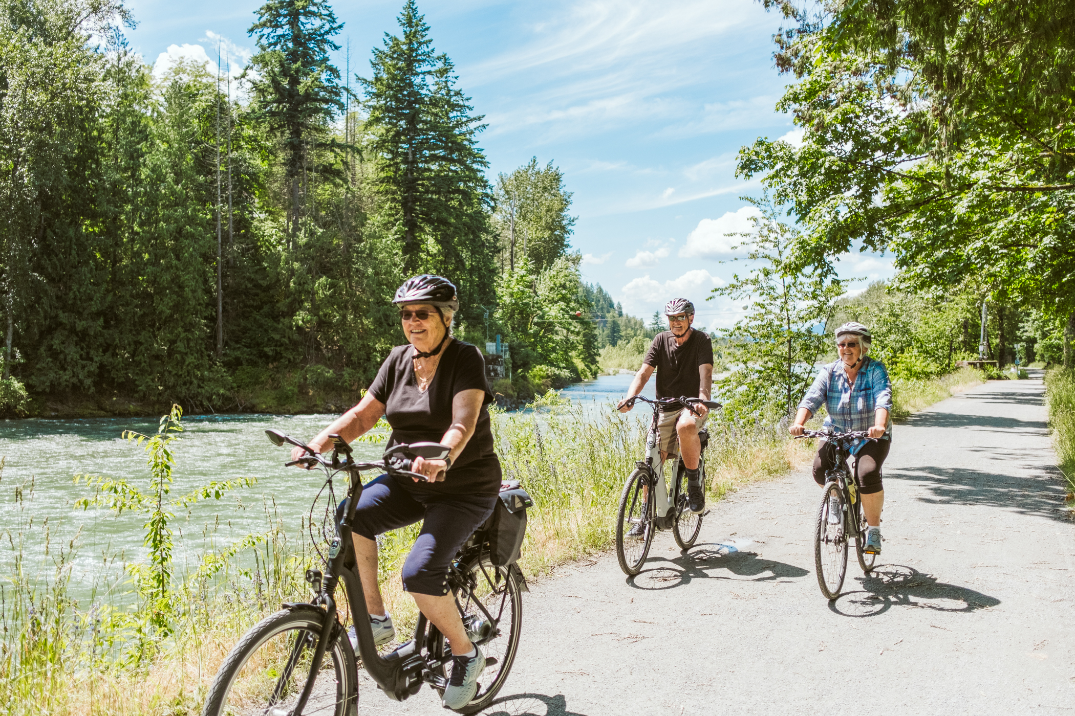 Elim Village residents biking along the Vedder River trail